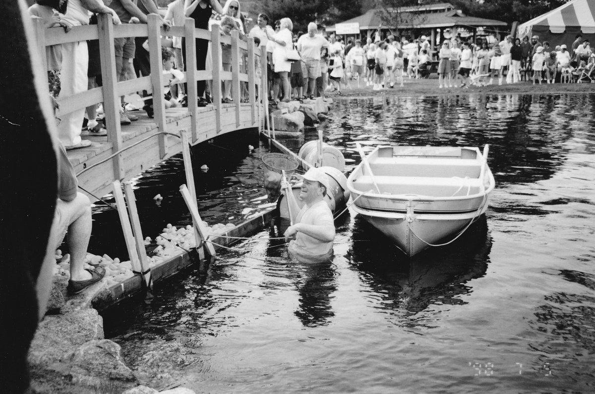 Meredith Lions Club Ducky Race finish line at Mill Falls, July 4, 1998. Marie Valliere