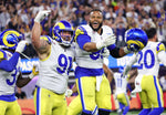 Los Angeles Rams defensive end Aaron Donald (99) celebrates his sack of Cincinnati Bengals quarterback Joe Burrow (9) near the end of in Super Bowl LVI at SoFi Stadium on Sunday, Feb. 13, 2022 in Inglewood, CA. Robert Gauthier / Los Angeles Times