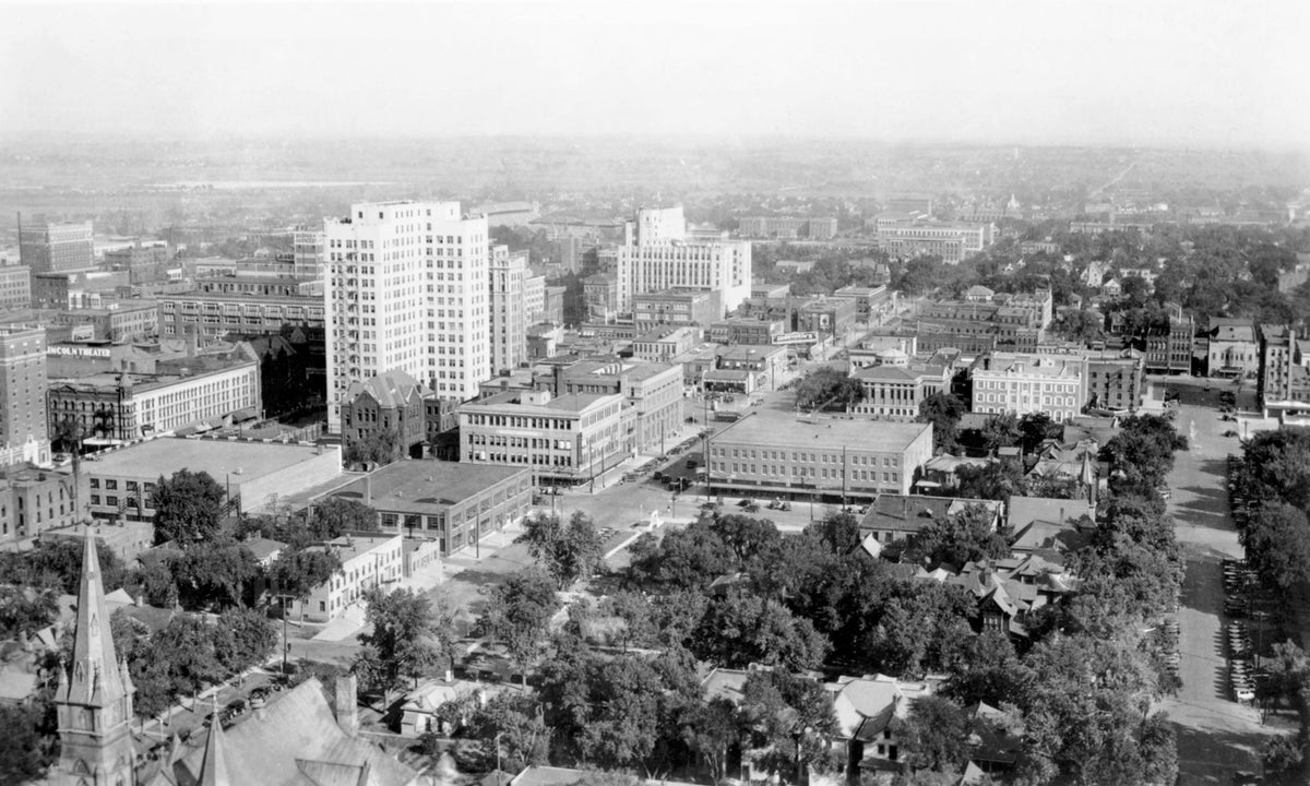 Aerial view of Lincoln, circa 1940. St. Mary’s Catholic Church is visible near the bottom of the photo. Oak Lake and the rail yards can be seen in the distance. Courtesy Nebraska State Historical Society / #RG2158.PH000001-000123