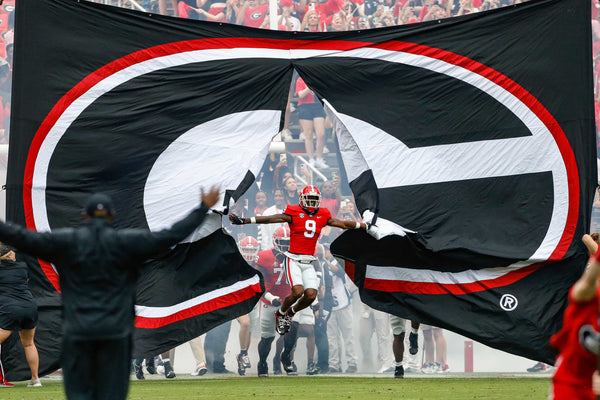 Georgia wide receiver Jackson Meeks (9) leads the team on to the field for the game between Samford and Georgia in Athens, Ga., Sept. 10, 2022. Joshua L. Jones / Athens Banner-Herald