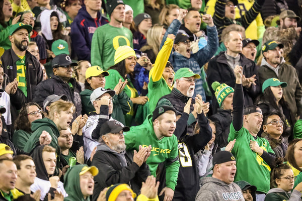 Fans cheer during the Oregon Ducks’ game against Arizona in Eugene. Courtesy The Oregonian / Serena Morones