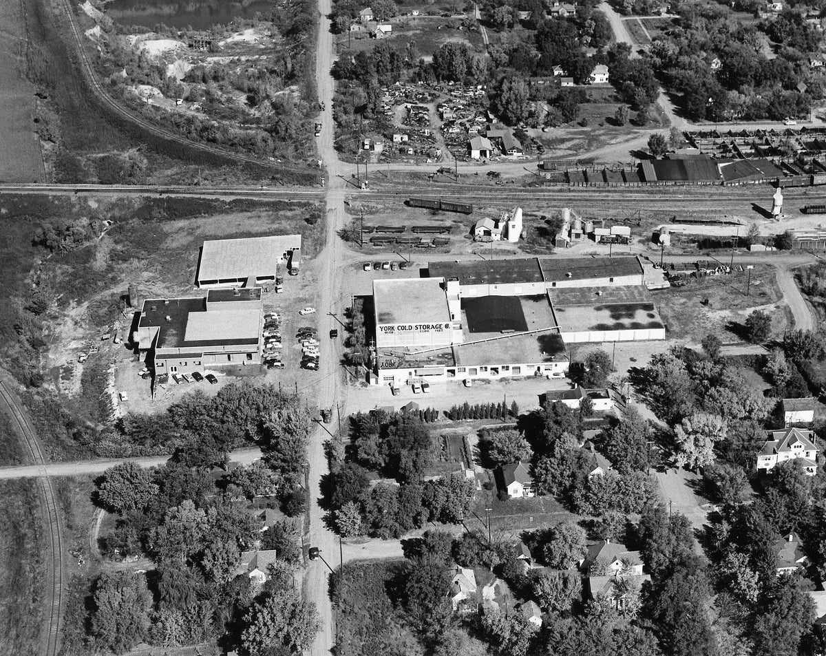 This is an aerial photo of North Division Avenue, showcasing York Cold Storage and the Burlington Northern Santa Fe Railroad.