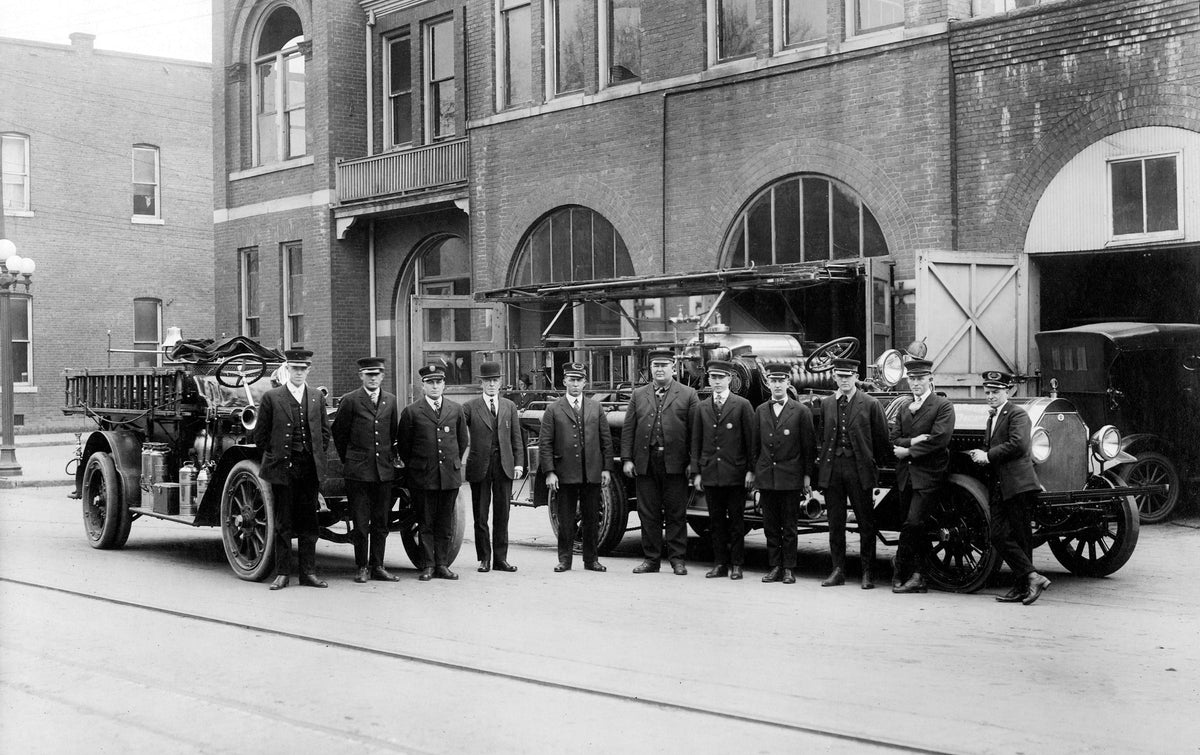 The Anderson Fire Department poses with trucks in front of the station, 1920s. Identified: Benjamin Terrel Gaines. Courtesy Anderson County Museum