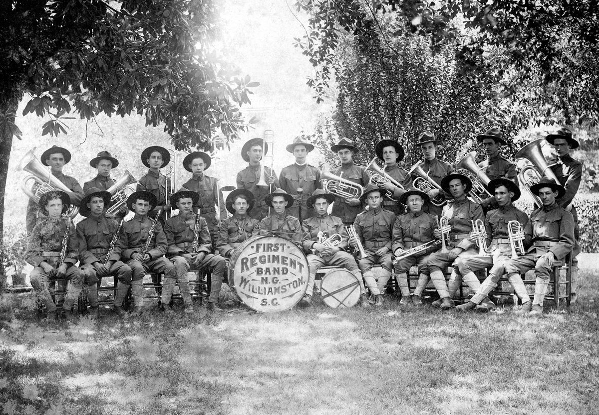 The First Williamston Regimental Band, Williamston. Those identified include: Henry Brandt, Gus Fostery, Mack Andrens, Raney King, Charles Koon, G.W. Wilhite, Ralph King, Sam Pruitt, Will Bandt, Jack Pruitt, Jim Shannon, Major Crawford, and C.N. Harris. Courtesy Anderson County Museum