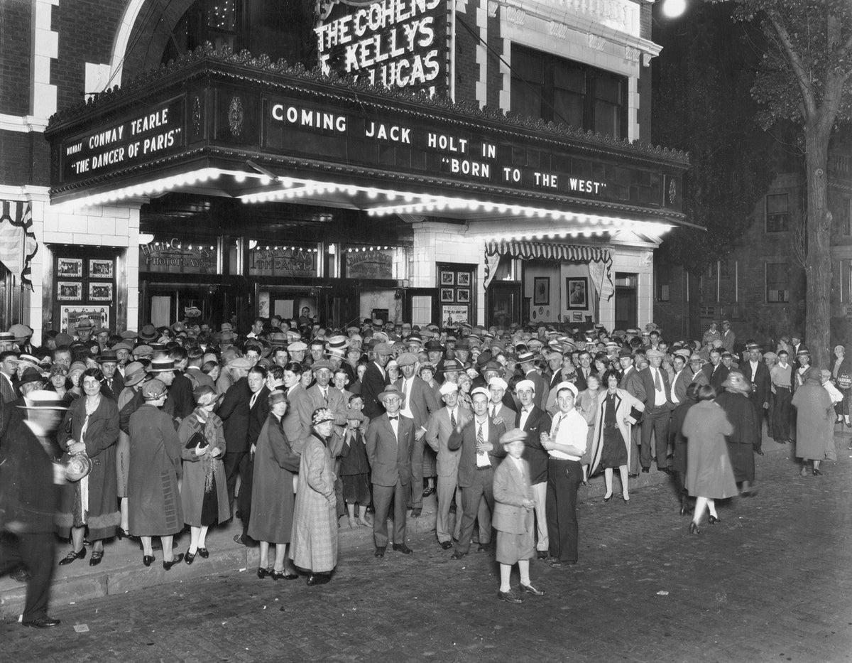Waiting outside of Irvin Theatre, Bloomington, circa 1926. Courtesy of the McLean County Museum of History