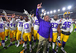 LSU head coach Ed Orgeron joins his players on the field in singing the alma mater following the Tigers' 58-37 win over Ole Miss, Nov. 16, 2019, at Vaught-Hemingway Stadium in Oxford, Miss. Courtesy Hilary Scheinuk/The Advocate