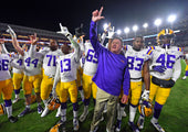 LSU head coach Ed Orgeron joins his players on the field in singing the alma mater following the Tigers' 58-37 win over Ole Miss, Nov. 16, 2019, at Vaught-Hemingway Stadium in Oxford, Miss. Courtesy Hilary Scheinuk/The Advocate