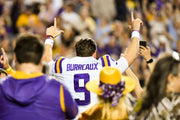 LSU quarterback Joe Burrow (9) salutes the crowd as he is recognized on the field during senior night festivities before kickoff as LSU hosts Texas A&M in the Tigers' regular season finale, Nov. 30, 2019. Courtesy Hilary Scheinuk/The Advocate ^^ left light rgba(30,30,30,0.5)