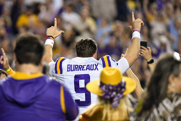 Joe Burrow salutes the crowd in his ‘Burreaux’ jersey during Senior Night festivities before the Texas A&M game on Nov. 30, 2019, in Tiger Stadium. Hilary Scheinuk / The Advocate