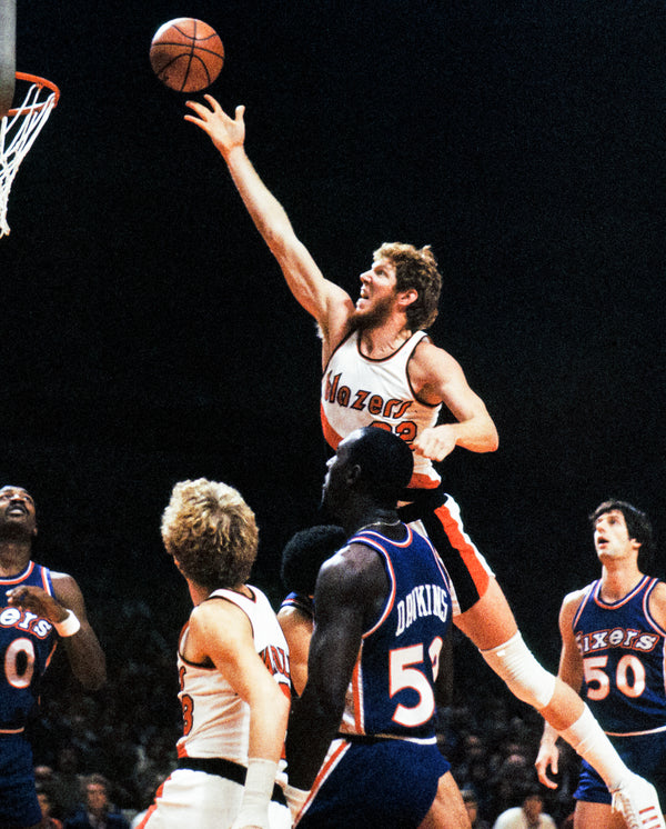 Blazers Bill Walton goes to the basket in 1978 against the Philadelphia 76ers in Portland. Roger Jensen / The Oregonian