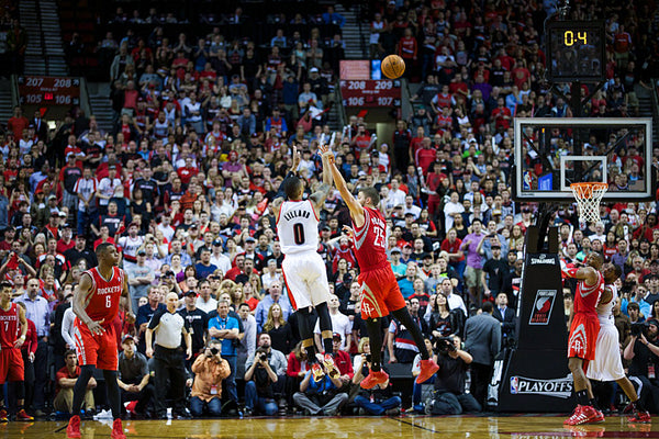 Portland Trail Blazers guard Damian Lillard (0) hits the game-winner as the Portland Trail Blazers face the Houston Rockets in the sixth game of the NBA playoffs. Bruce Ely / The Oregonian
