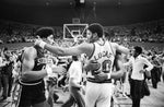 Blazers forward Maurice Lucas (20) shares a moment with 76ers star Julius Erving (6) after Game 6 of the 1977 NBA Finals. Michael Lloyd / The Oregonian/OregonLive