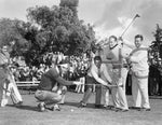 Several men clown around with entertainer Bob Hope at Chula Vista Country Club as he prepares to take a swing in February 1953. CourtesySan Diego History Center (#10174)