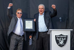 Team owner Mark Davis, left, cheers with Nevada Gov. Steve Sisolak after being presented with a proclamation during the Las Vegas Raiders naming ceremony at Allegiant Stadium on Jan. 22, 2020. L.E. Baskow/Las Vegas Review-Journal