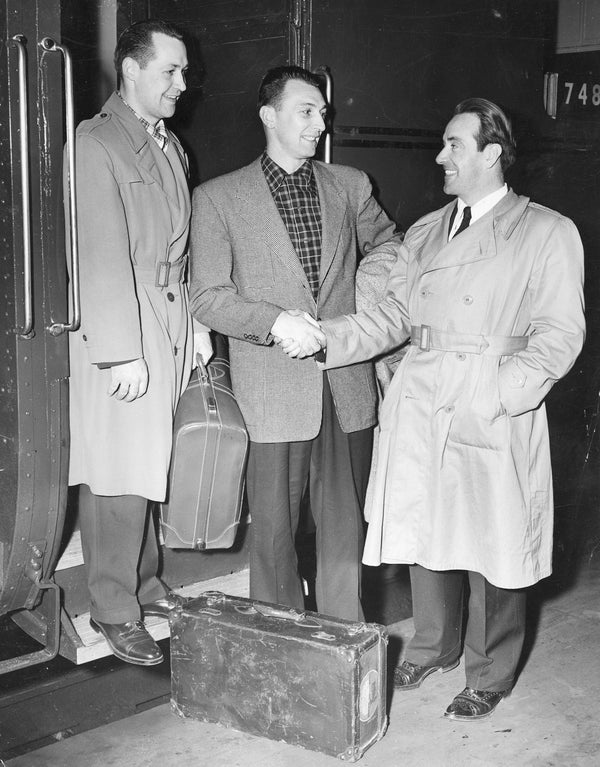 South Buffalo native Cy Williams, far right, wishes a safe journey to Warner "Babe" Birrer, far left, at the Central Train Station, circa 1954. Courtesy Ed Williams