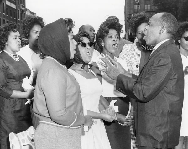 Robert Rosenbourgh directs a group of singers at the Fight for Freedom Fund Rally of the NAACP, Niagara Square, August 1963. Buffalo News archives