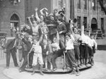 Children enjoy the merry-go-round at Lower Terrace playground, May 6, 1936. Buffalo News Archives