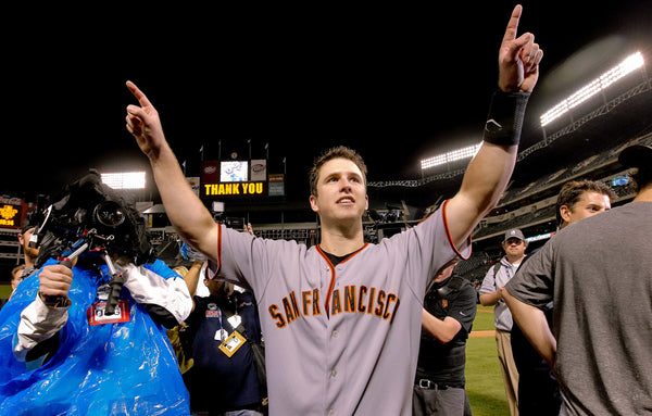 Giants Buster Posey parades around the field waving to fans following San Francisco's win of the 2010 World Series over the Texas Rangers on Monday Nov. 1, 2010 in Arlington, Tx., with a score of 3-1. Michael Macor / The Chronicle