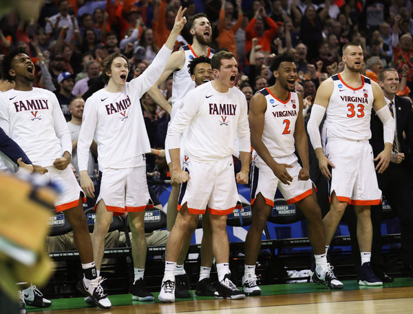 The Virginia bench reacts in the second half at Colonial Life Arena. Courtesy Zack Wajsgras/The Daily Progress