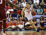 Virginia guard Kyle Guy (5) pushes the ball up court in the first half at Colonial Life Arena. Virginia went into the half with a 31-22 lead over the Sooners. Courtesy Zack Wajsgras/The Daily Progress