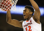 Virginia guard De'Andre Hunter (12) dunks the ball late in the second half at Colonial Life Arena on Sunday. Virginia held a comfortable lead throughout the game and finished with a 63-51 victory, advancing the Wahoos to the Sweet Sixteen. Courtesy Zack Wajsgras/The Daily Progress