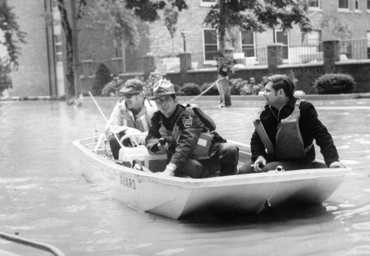 A boat navigates floodwaters on Wyoming Avenue near Nesbitt Hospital. The Citizens’ Voice