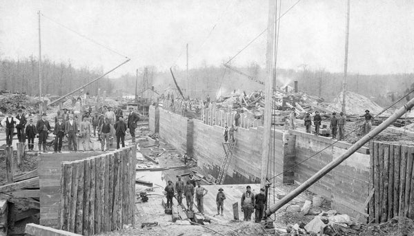 Rebuilding the lock on the Dismal Swamp Canal in South Mills, 1896. The stamp on the back indicates the photo was taken by the Zoeller, Morgan Company of Elizabeth City. At this time Zoeller and Morgan could be seen taking photos all around Camden County and surrounding communities. Courtesy Camden County Heritage Museum, Alex Leary