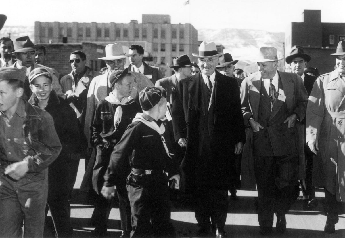 President Harry Truman walking with the Secretary of War and Natrona County Sheriff to the Casper train station during a 1949 visit. Courtesy Bob Ide, Ide Land & Leasing