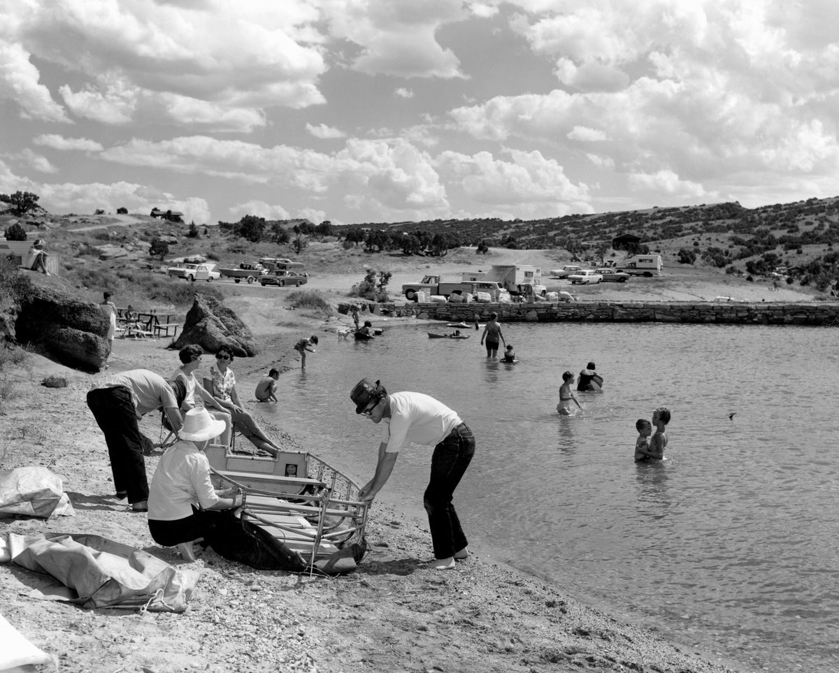 Orval Dehning and friends constructing a bull-boat on the beach at Alcova Reservoir on July 27, 1968. Courtesy Casper College Western History Center