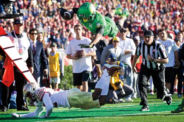 Nelson leaps for the end zone after taking a shovel pass from Mariota in the first quarter. Nelson landed just short of the end zone. Thomas Boyd/The Oregonian/OregonLive