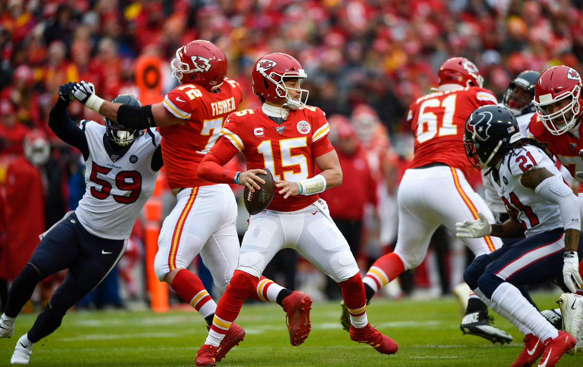 Kansas City Chiefs quarterback Patrick Mahomes looks for an open receiver in the first quarter against the Houston Texans on January 12, 2020, at Arrowhead Stadium in Kansas City, Missouri. Courtesy Tammy Ljungblad / The Kansas City Star  ^^ center light rgba(0,0,0,0.25)