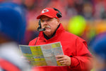 Kansas City Chiefs head coach looks over his game plan as he leads his team to a 51-31 victory of the Houston Texans on January 12, 2020, at Arrowhead Stadium in Kansas City, Missouri. Courtesy Rich Sugg / The Kansas City Star