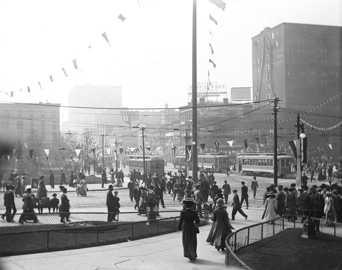 Cleveland is bustling with activity during the Cuyahoga County Centennial, October 1910. This view is from the Soldier's and Sailor's Monument looking west and north along Superior Avenue. Courtesy David M. Thum