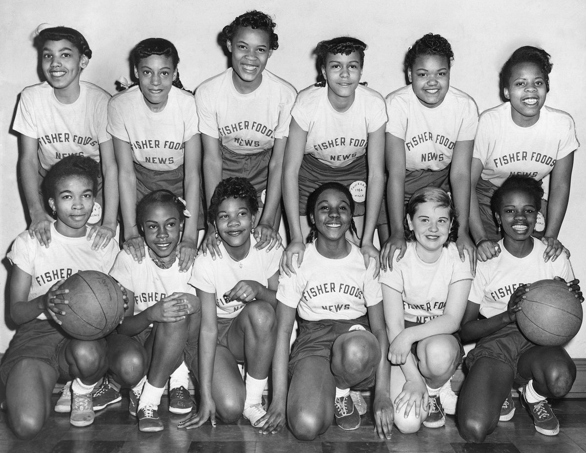 Girls basketball team sponsored by Fisher Foods, March 1954. Back row, from left: Florence Walker, Vivian Brown, Muriel Overton, Millie Jackson, Doretta Harris, Beverly Wyatt. Front row: Juanita Gray, Ernestine Rush, Mabel Jones, Veronica Delitory, Lynn Prymmer, Elizabeth Grayson. Courtesy Cleveland Public Library Photograph Collection/#SCL016773