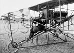 Julia Clark, a student at the Curtiss Flight School, seated in an early Wright pusher plane with the propeller in the back, circa 1910. San Diego History Center (#6096)