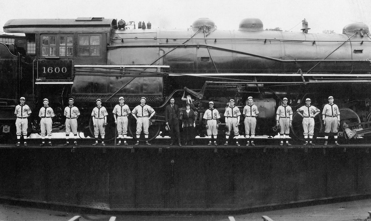 The Delaware & Hudson Motive Power Shop baseball team with D&H No. 1600 on the turntable in Carbondale in 1921. From left: Jimmy Carden, Tom Boylan, Johnnie Leo, Mallica Mannion, Reuben Molinaro, unidentified, Maurice Blockseige (foreman of D&H paint shop), Lena McGowan (secretary of the baseball team), Scanky Leo, Jimmy Tyson, Joe Beahan, Phil Farber, Jimmy Farrell, Pat Sharkey. Courtesy Carbondale Historical Society