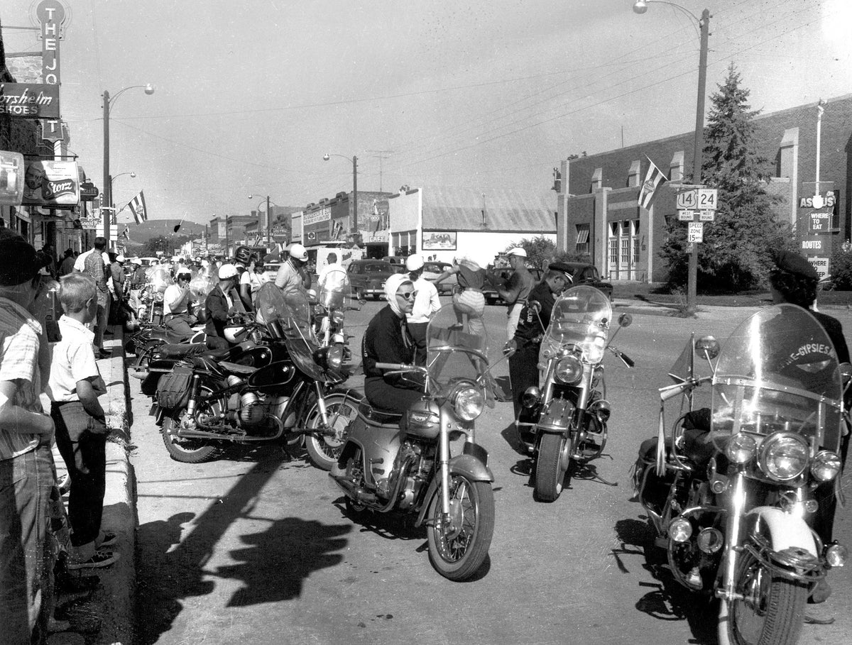 Members of the Jackpine Gypsies motorcycle club line up before the start of the 1955 tour.