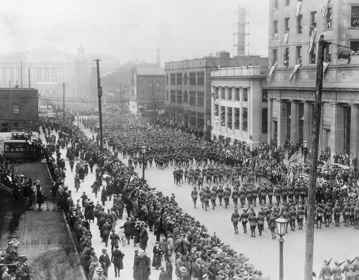 The return of the 145th Regiment, marching down East 6th Street to the Central Armory, April 10, 1919. Courtesy Cleveland Public Library