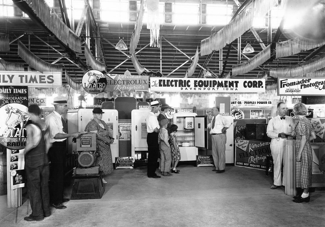 Exhibition booth for the Electric Equipment Corporation of Davenport, part of Republic Electric Company, circa late 1920s. They sold “modern conveniences” such as electric irons, radios, Delco electric plants, early kerosene refrigerators and ice boxes. Courtesy Republic Electric