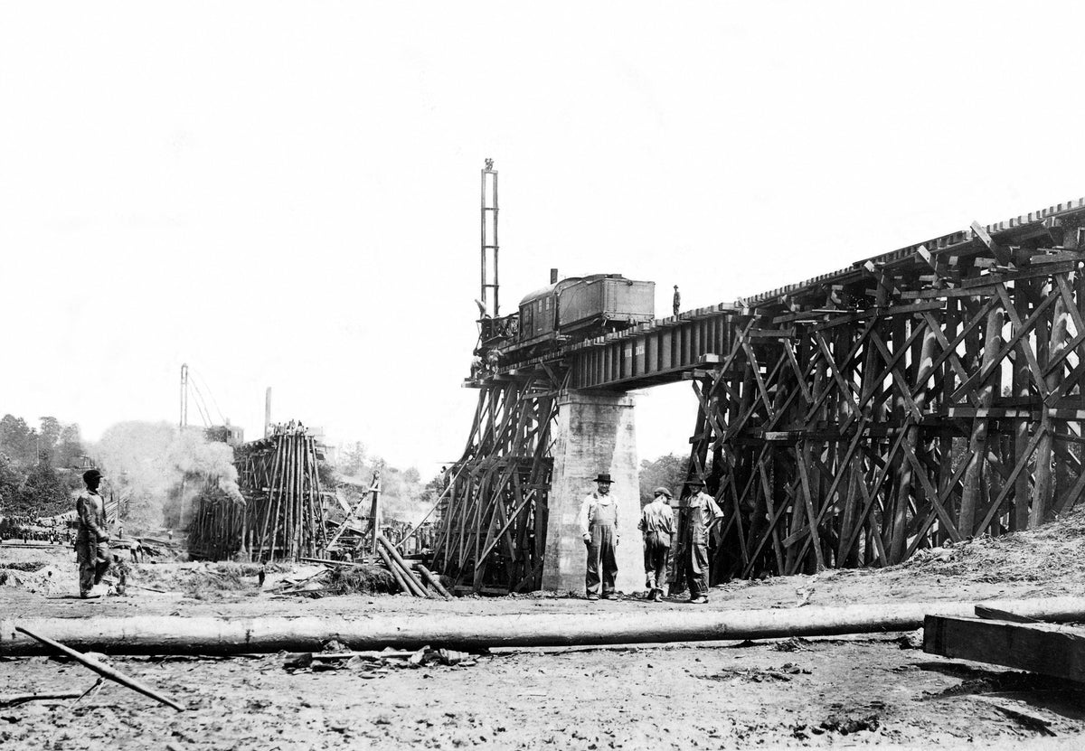 Railway trestle at the Catawba River in Belmont being rebuilt after the 1916 flood. Courtesy Millican Pictorial History Museum