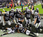 Las Vegas Raiders defensive players celebrate after recovering a fumble in the fourth quarter during an NFL football game against the Denver Broncos on Nov. 15, 2020, at Allegiant Stadium in Las Vegas. Benjamin Hager/Las Vegas Review-Journal