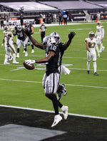 Las Vegas Raiders wide receiver Zay Jones (12) celebrates with Las Vegas Raiders running back Jalen Richard (30) after catching a touchdown pass in the second quarter during an NFL football game with the New Orleans Saints on Sept. 21, 2020, at Allegiant Stadium in Las Vegas. Benjamin Hager/Las Vegas Review-Journal