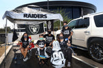 Mariela McMary, from left, with Liam Trimble, 5, his uncle Gene Valencia, mother Tanya Trimble, and aunt Jennifer Valencia, tailgate before an NFL football game between the Las Vegas Raiders and the Buffalo Bills on Oct. 4, 2020, at Allegiant Stadium in Las Vegas. Erik Verduzco/Las Vegas Review-Journal