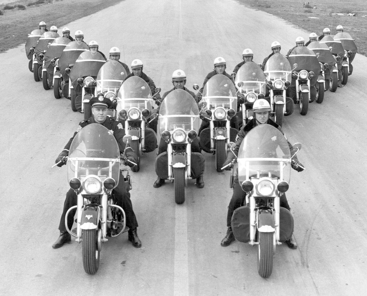 The Fresno Police Motorcycle Drill Team practices formations for competitions, July 1957. In the front row are Captain A.G. Ellis and Sergeant William Roberts. Courtesy The Fresno Bee