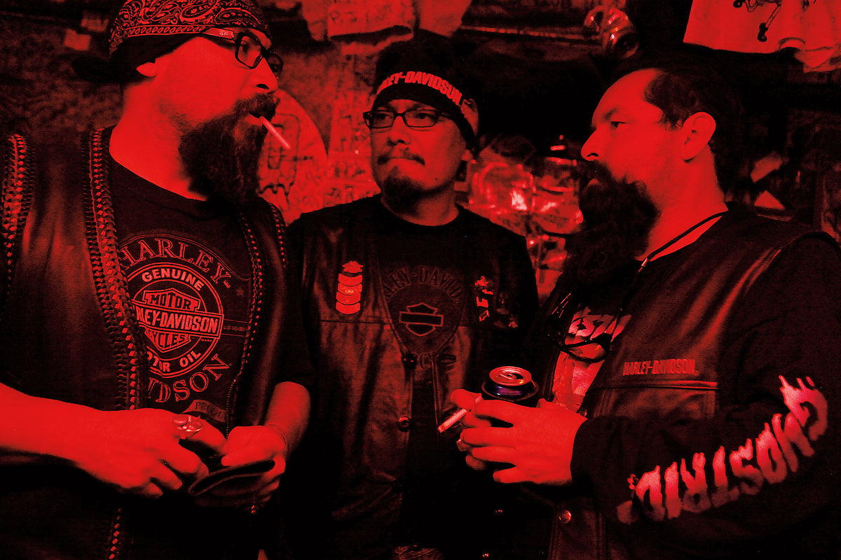 Anthony Rodriguez, left, Daniel Dirty D, and Lorenzo Vallejo, all from California, stop at the Dungeon Bar in downtown Sturgis during the motorcycle rally in 2010.
