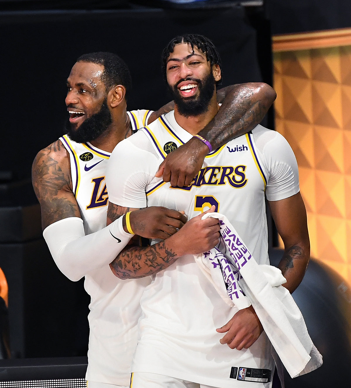 They were off to themselves as the final seconds ticked down, but LeBron James, left, and Anthony Davis started to contemplate what they accomplished in bringing the Lakers their 17th NBA title. Wally Skalij / Los Angeles Times