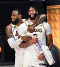 They were off to themselves as the final seconds ticked down, but LeBron James, left, and Anthony Davis started to contemplate what they accomplished in bringing the Lakers their 17th NBA title. Wally Skalij / Los Angeles Times