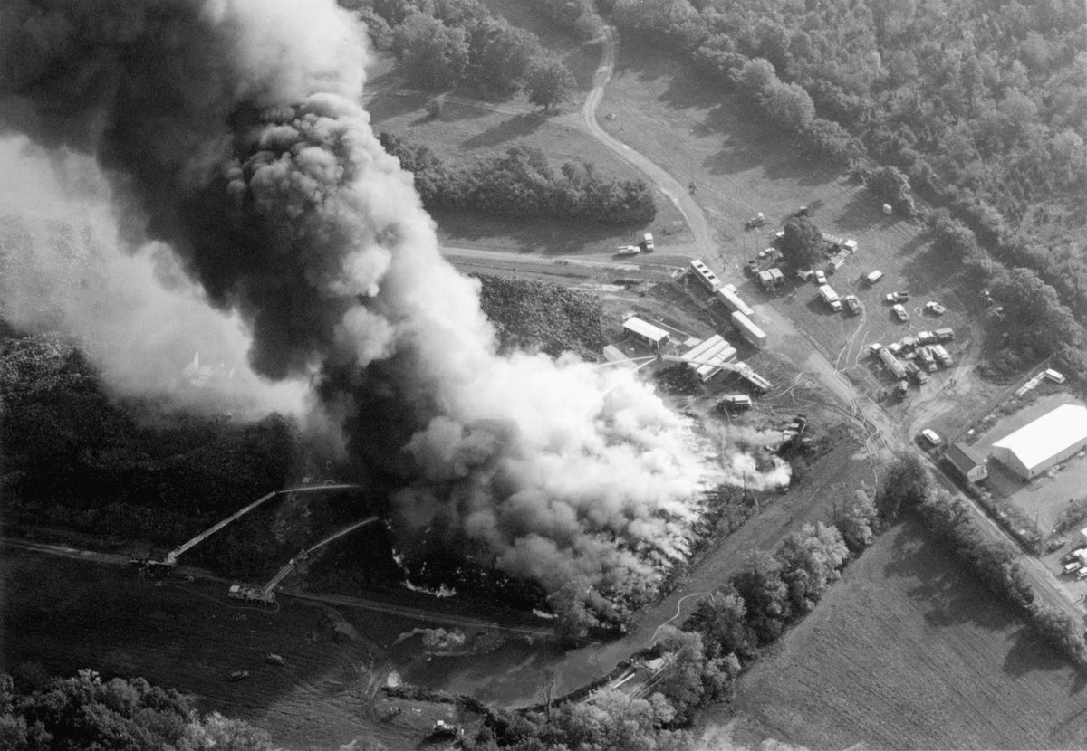 Heavy black smoke could be seen for miles from an arson fire at a 10-acre dump of old tires, Inwood, 1993. Fire crews from three states and National Guard members were sent in to fight the blaze. No injuries were reported, and no evacuations were ordered despite the heavy smoke. Capt. Scott W. Stroop Retired Martinsburg Fire Department