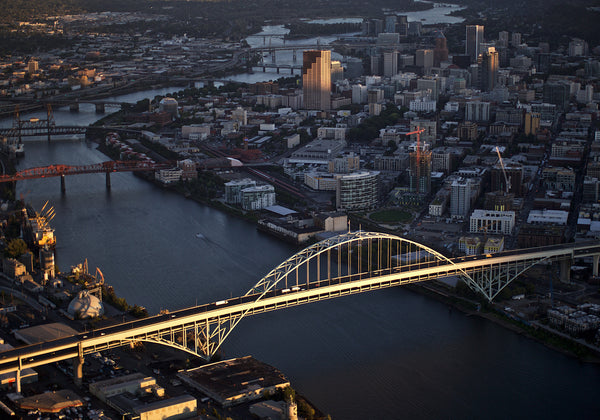 The setting sun illuminates the Fremont Bridge, which carries Interstate 405 traffic over the Willamette River. Bruce Ely/The Oregonian/OregonLive