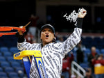 Coach Dawn Staley cuts down the net after South Carolina beat Creighton 80-50 on March 27, 2022, securing the regional win and a trip to the Final Four. Tracy Glantz / The State